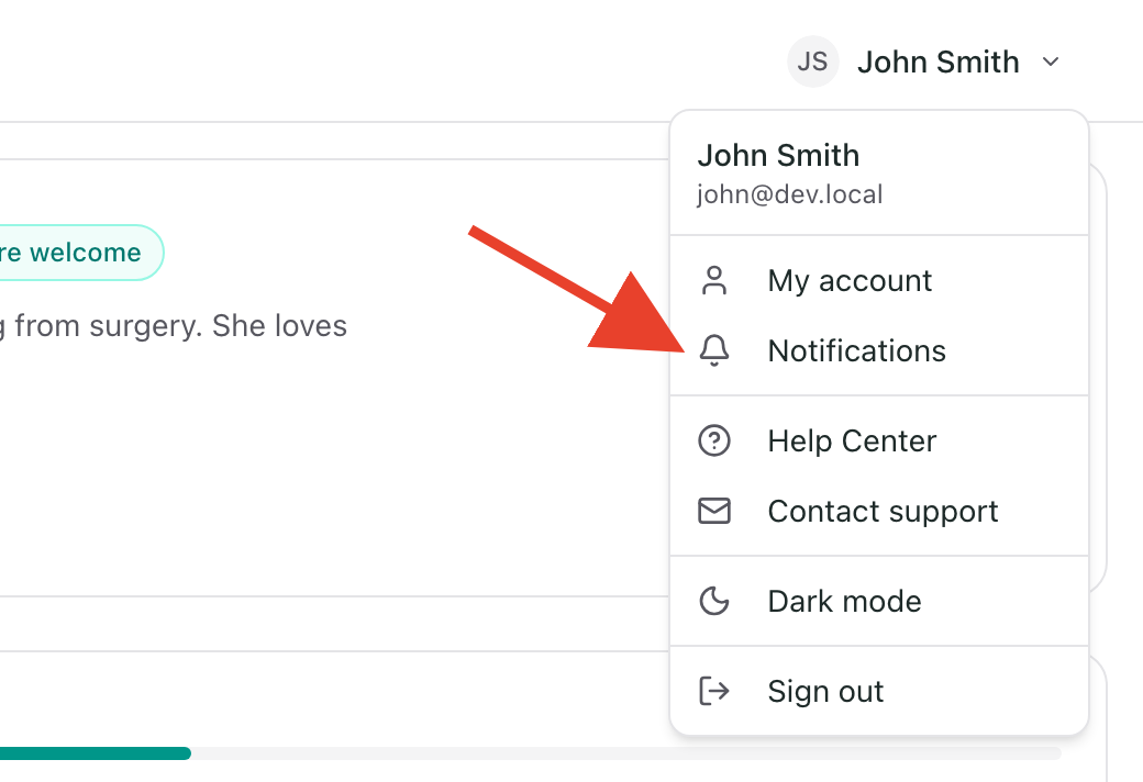 The profile menu open, with a red arrow pointing to the Notifications item